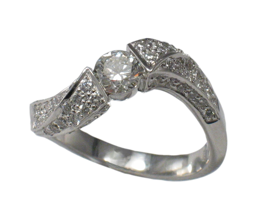 A diamond Ring with delicate carvings.